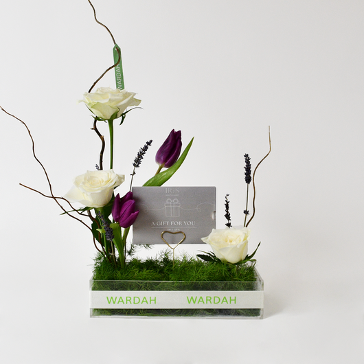 Iris spa gift card with arrangement flowers in a tray