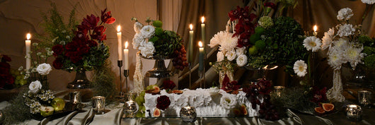 elegant red, green and white table setup arrangement  