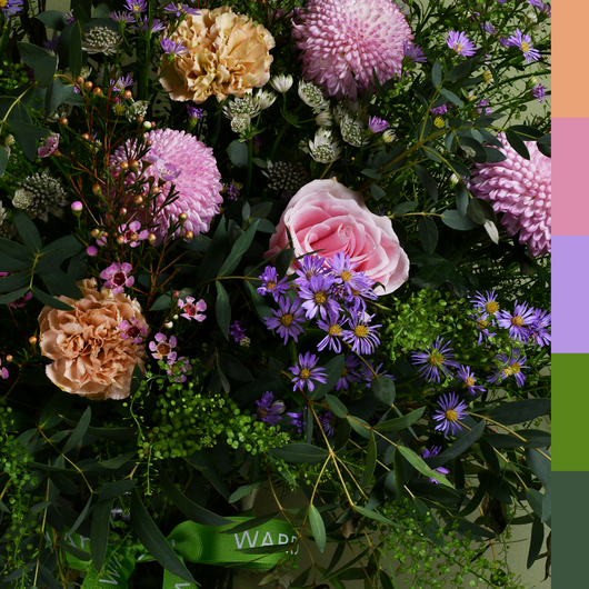 pastel and green flowers arrangement in big vase
