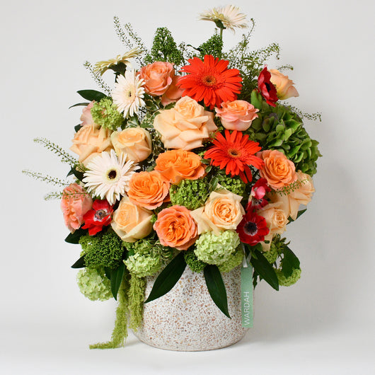 PEACH RED AND WHITE FLOWERS ARRANGEMENT IN A VASE