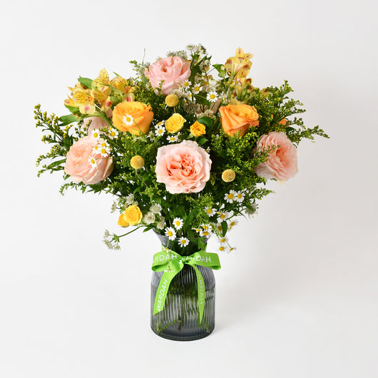 PINK AND YELLOW ARRANGEMENT IN A VASE
