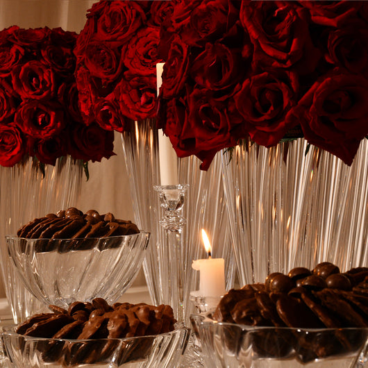 roses in crystal vase and chocolate