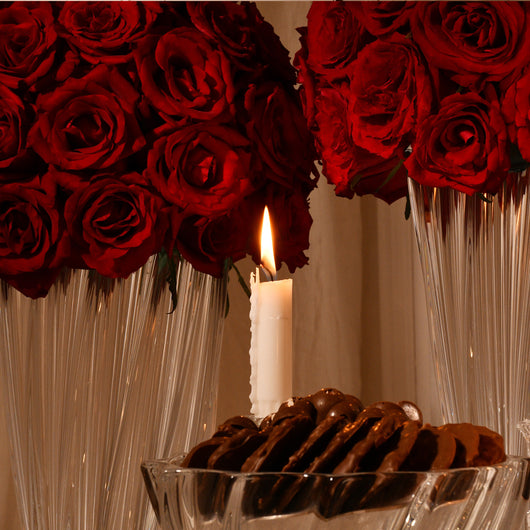 roses in crystal vase and chocolate
