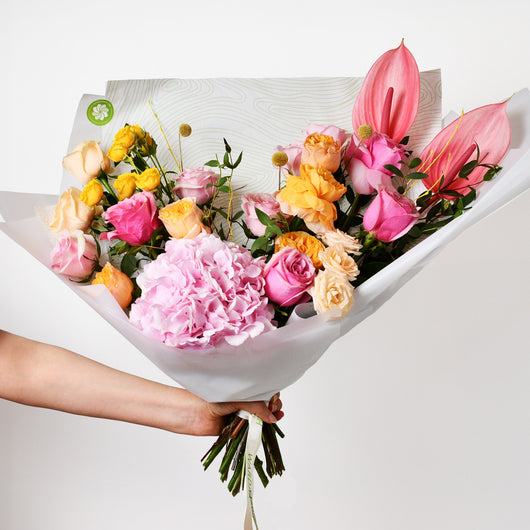 pink, yellow and peach flower bouquet