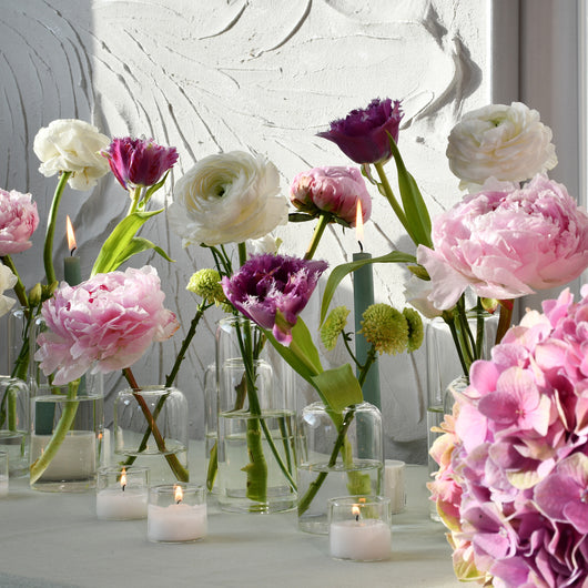 Table escape vases with fresh pink & white flowers 