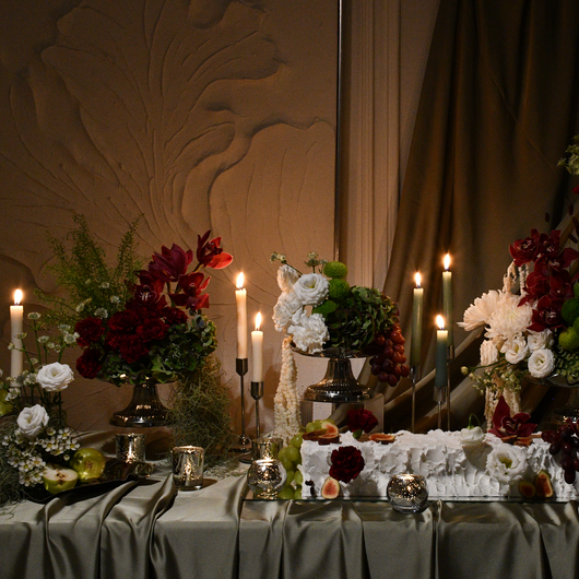 elegant red, green and white table setup arrangement  