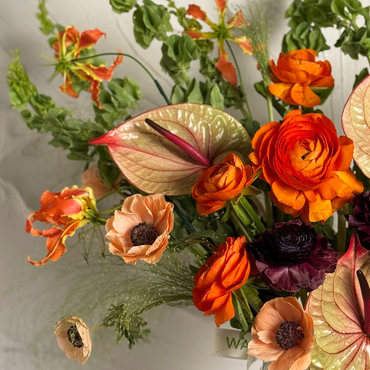 autumn arrangement with ranunculus and anemone flower