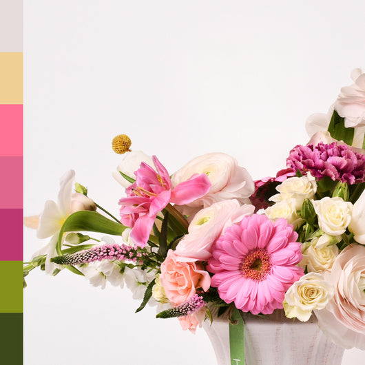 white and pink flowers arrangement vase