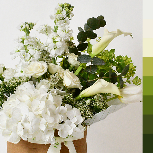 white flowers arrangement in a vase